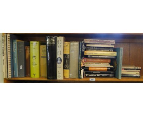 Shelf of hardback reference books