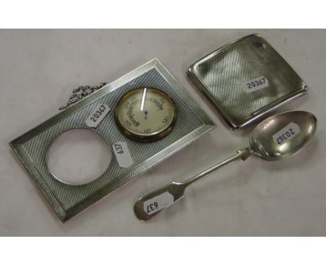 Engine turned silver desk stand A/F , engine turned silver cigarette box, & a silver table spoon,5 oz weighable