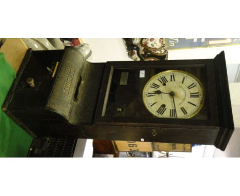 A Clocking-in clock by The National Time Recorder Co. of St Mary Cray, Kent