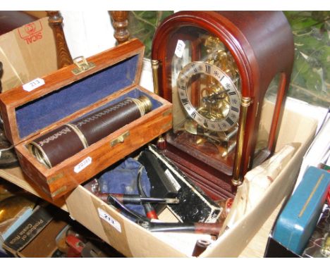Telescope in wooden box, a clock, pipes etc