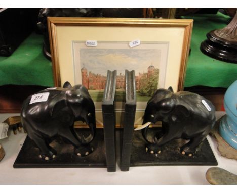 Pair of ebony elephant bookends & a print of Cobham Hall