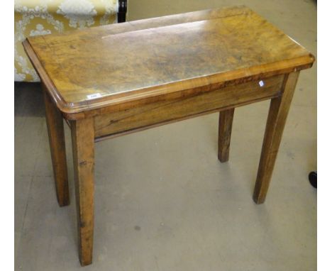 A Victorian burr walnut rectangular foldover card table on square tapered legs