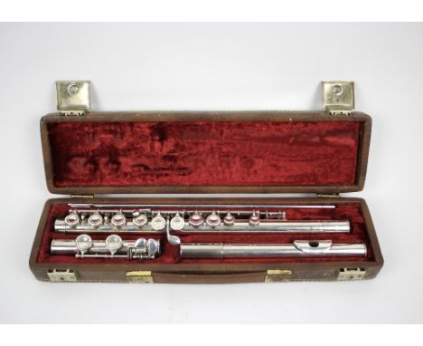 Boosey and Hawkes - A Flute in a fitted case, marked with makers name and numbered 514573.&nbsp;&nbsp;