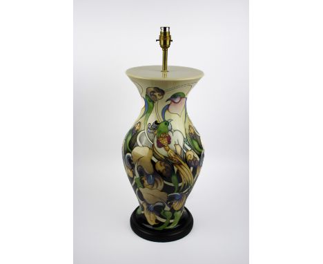 An impressive and rare large Moorcroft table lamp in the "Fleur De Luce" pattern designed by Emma Bossons on a turned wooden 