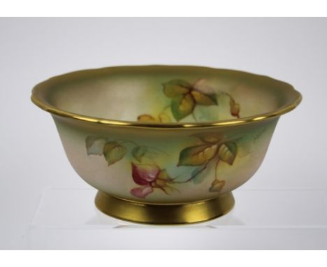 A Royal Worcester porcelain bowl painted with roses - puce printed factory mark with date code for 1941, circular with shaped