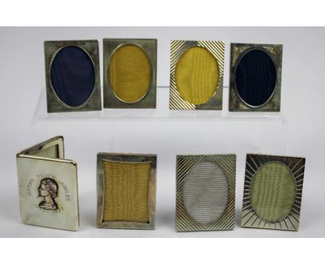 Eight silver photograph frames with various decorated borders and strut back supports, all London, two 1988, two 1991, 1977, 