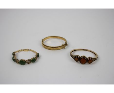 Two Bangles and a Bracelet , comprising a hinged gold and citrine bangle circa 1900, a 9carat gold hinged bangle hall marked 