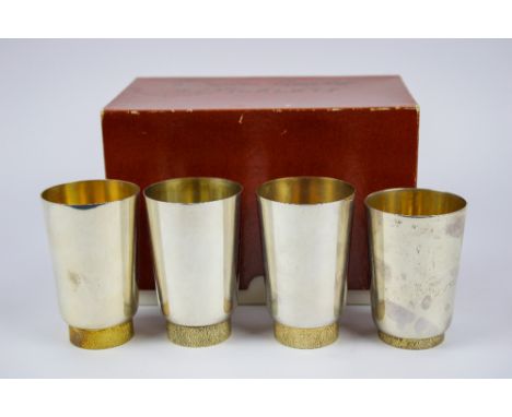 Four silver and silver gilt tumblers, all marked London , three 1977 and one 1976, Markers mark for Richard Lawrence Geere. a