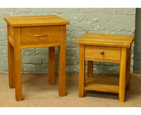 Two solid light oak modern bedside tables with single drawers.