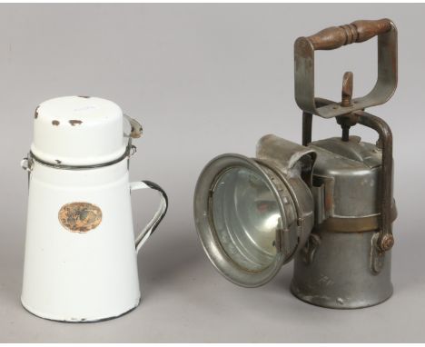 The Premiere Carbide railway lantern and an enamel jug and beaker set.