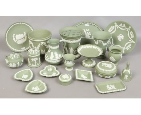 A large quantity of green Wedgwood Jasperware including a William Shakespeare commemorative plate, centrepiece, vases, trinke