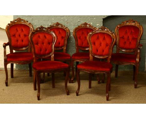 A set of four plus two carver dining chairs with red upholstery and deep button backs.