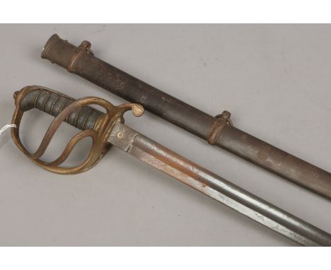 A J. Lyons Royal Artillery sword in metal scabbard with shagreen grip and etched blade, approximately 87cm.