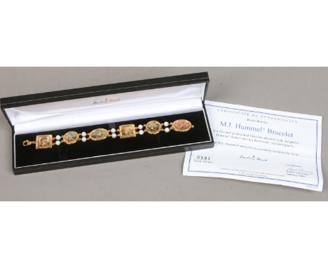An 18ct gold plated M. J. Hummel bracelet with 10 freshwater cultured pearls.