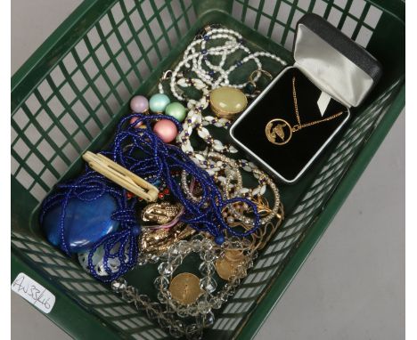 A small box of costume jewellery including pearl and Lapis Lazuli necklaces.