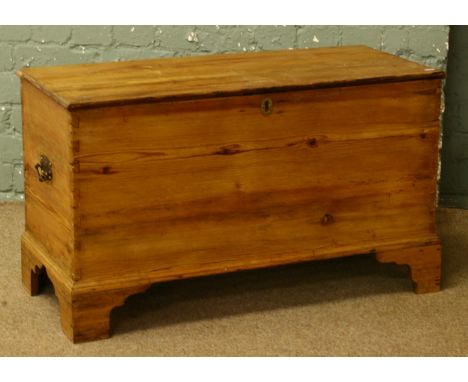 A Victorian pine blanket box raised on bracket supports.