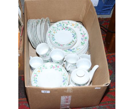 A Royal Norfolk pottery tea and dinner service decorated with bands of flowers.