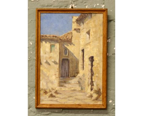 A framed oil on board label verso with title 'in a little hilltown' artist K. R. Truscroft.