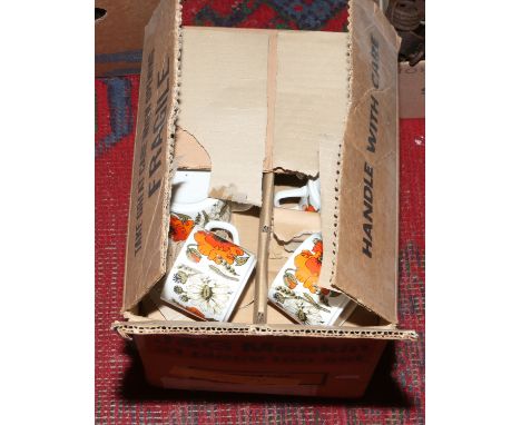 A J. G. Meakin 21 piece tea service decorated in the poppy pattern in original box.