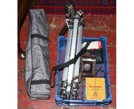 A quantity of photographic equipment including a boxed Kodak Brownie Reflex, a Braun Paxette camera in case, tripods etc.