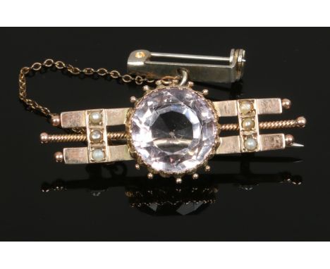 An amethyst and seed pearl bar brooch. 