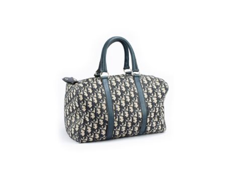 Christian Dior 'Bowling Bag'1990er Jahre, Canvas mit blauem Dior Schriftzug, dunkelblaues Leder, silberfarbenerReißverschluss