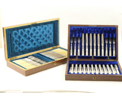 Late Victorian canteen of mother of pearl handled dessert knives and forks, 18 place settings, with engraved plated blades, c