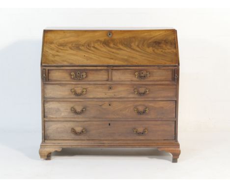 George III mahogany bureau, circa 1780-1800, figured mahogany slope front opening to a fitted interior with central cupboard 