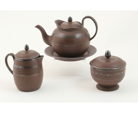Staffordshire brown stoneware tea service, possibly Neale &amp; Co., circa 1810, with turned details and applied silver folia