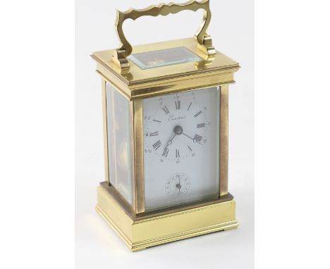 French brass carriage clock, with alarm, white dial with Roman numerals, signed and with subsidiary alarm dial, the movement 