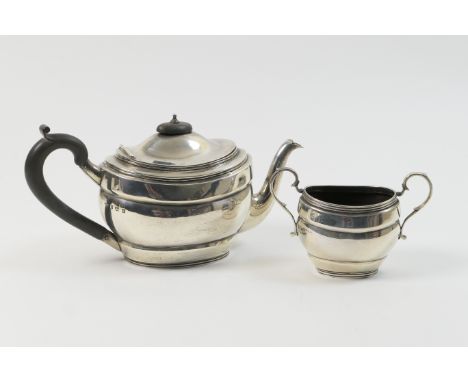 George V silver teapot and sugar bowl, by Mappin &amp; Webb, Sheffield 1918, oval section, the teapot with hinged cover, ebon