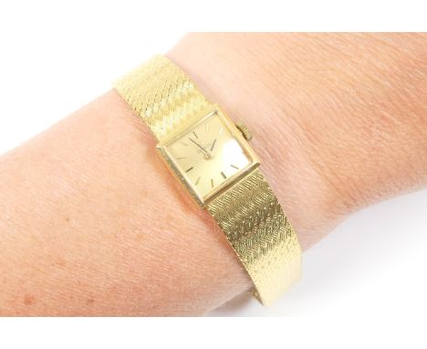 Omega 18ct gold lady's bracelet wristwatch, circa 1990s, small square gold coloured dial, 11mm, with baton numerals, manual w