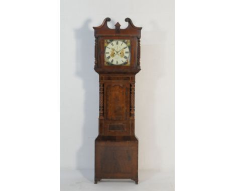 Welsh mahogany eight day longcase clock by Griffith Davies of Dolgellau, the hood with wrythen and turned columns flanking a 