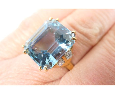 Aquamarine and diamond dress ring, step cut central aquamarine of approx. 12cts (14.2 x 12.3 x 9.3mm), four double claws and 