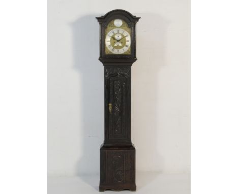 Oak eight day longcase clock, by John Dison, St Ives, later carved hood and case, with 11.5 ins arched brass dial, signed to 