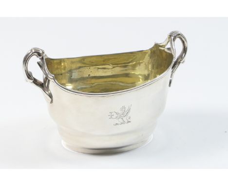 George III silver sugar basin, London 1810, twin handled oval form with original gilt interior and engraved with a griffin cr