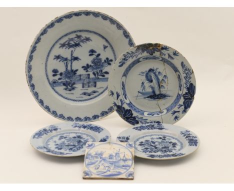 Delft blue and white plate, probably Liverpool, in the peony, bamboo and fence pattern, circa 1740-60, 36cm diameter; also a 