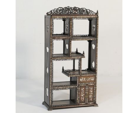 Chinese rosewood and mother of pearl inlaid display stand, early 20th Century, having open galleried shelves faced with mothe