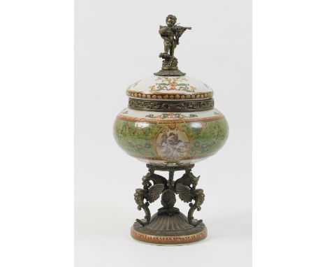 Decorative French style metal mounted porcelain jar and cover, surmounted with a fiddle playing cherub, the porcelain decorat