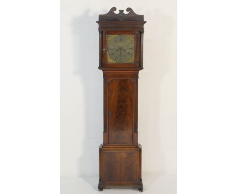 George III mahogany eight day longcase clock, the hood with fluted pilasters flanking a 13 ins brass square dial, signed to t