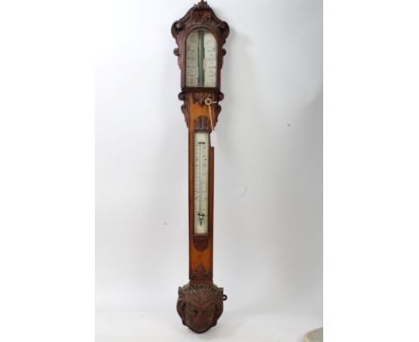 Victorian stick barometer with ivory scale, signed - 'G. Lowther 31 Quayside Newcastle on Tyne', in ornate carved oak case wi