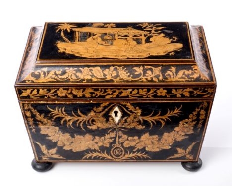 Regency pen-work tea caddy of sarcophagus form, on squat ball feet, the lid decorated with chinoiserie, enclosing interior wi
