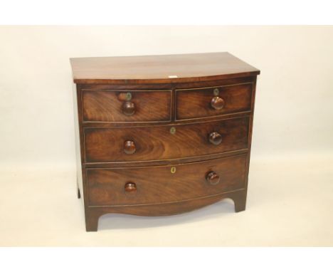 Small size Regency mahogany bow front chest of drawers, having two short over two long drawers, on bracket feet, 89cm wide x 