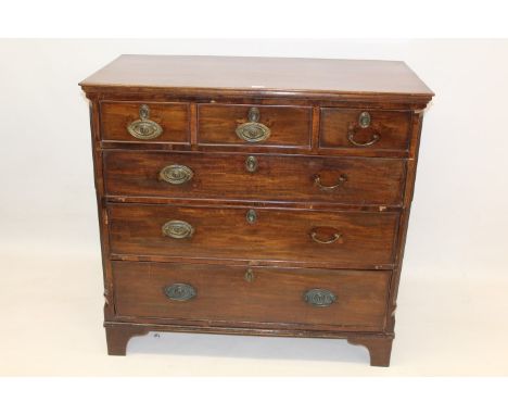 Regency mahogany chest of drawers having three short over three long graduated drawers between canted reeded angles on bracke