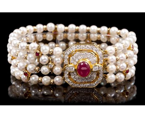 Fine diamond, ruby and cultured pearl bracelet with four strands of cultured pearls, each pearl measuring approximately 5.1mm
