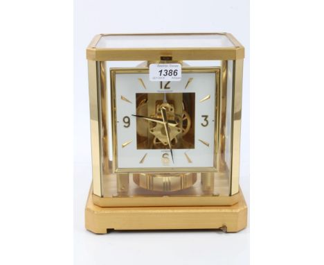 Jaeger-LeCoultre Atmos clock, calibre 528-8, serial no. 344571, in gilt metal glazed case with white dial and gilt numerals, 