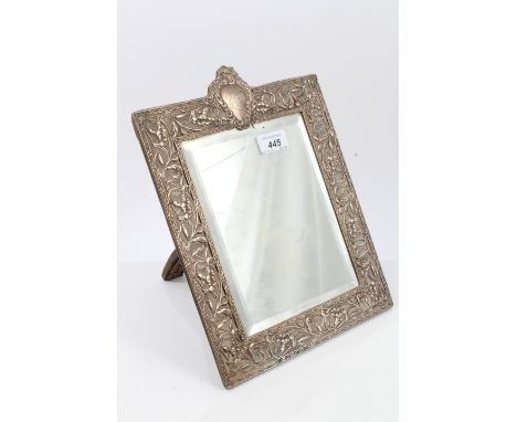 Early 20th century silver photograph frame of rectangular form, with pierced Art Nouveau-style floral decoration, central car