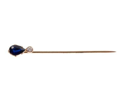 Sapphire and diamond stick pin, the pear cut blue sapphire with an old cut diamond below