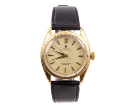 1950s gentlemen's Rolex gold (18ct) Oyster Perpetual wristwatch.  Model 6085.  No. 730398, with cream dial, baton numerals, d