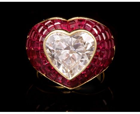 Fine Sabbadini diamond and ruby ring, the heart-shape diamond weighing approximately 5.29 carats, in rub-over setting, the bo